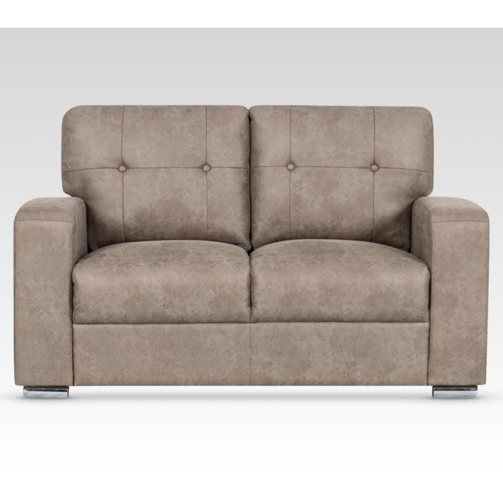 Beige sofa with buttoned backrest on a white background