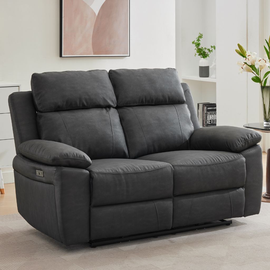 A dark grey electric reclining 2-seater sofa 