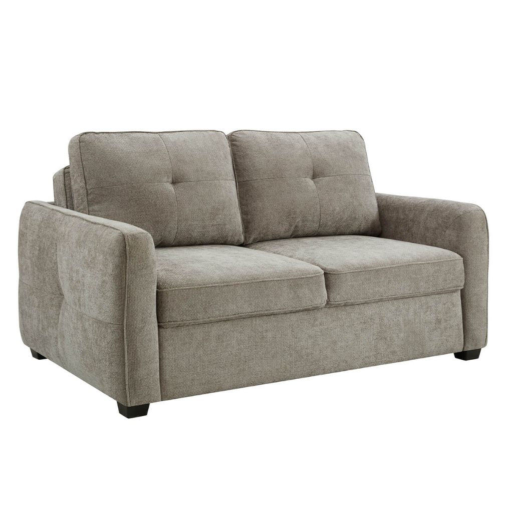 Beautiful beige sofa with pin tuck details on the back cushions and arms.