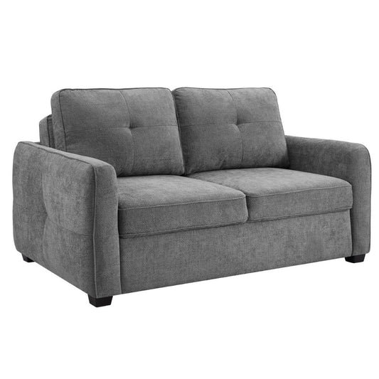 A grey fabric sofa bed with beautiful pin tuck details on the back cushion and arms.
