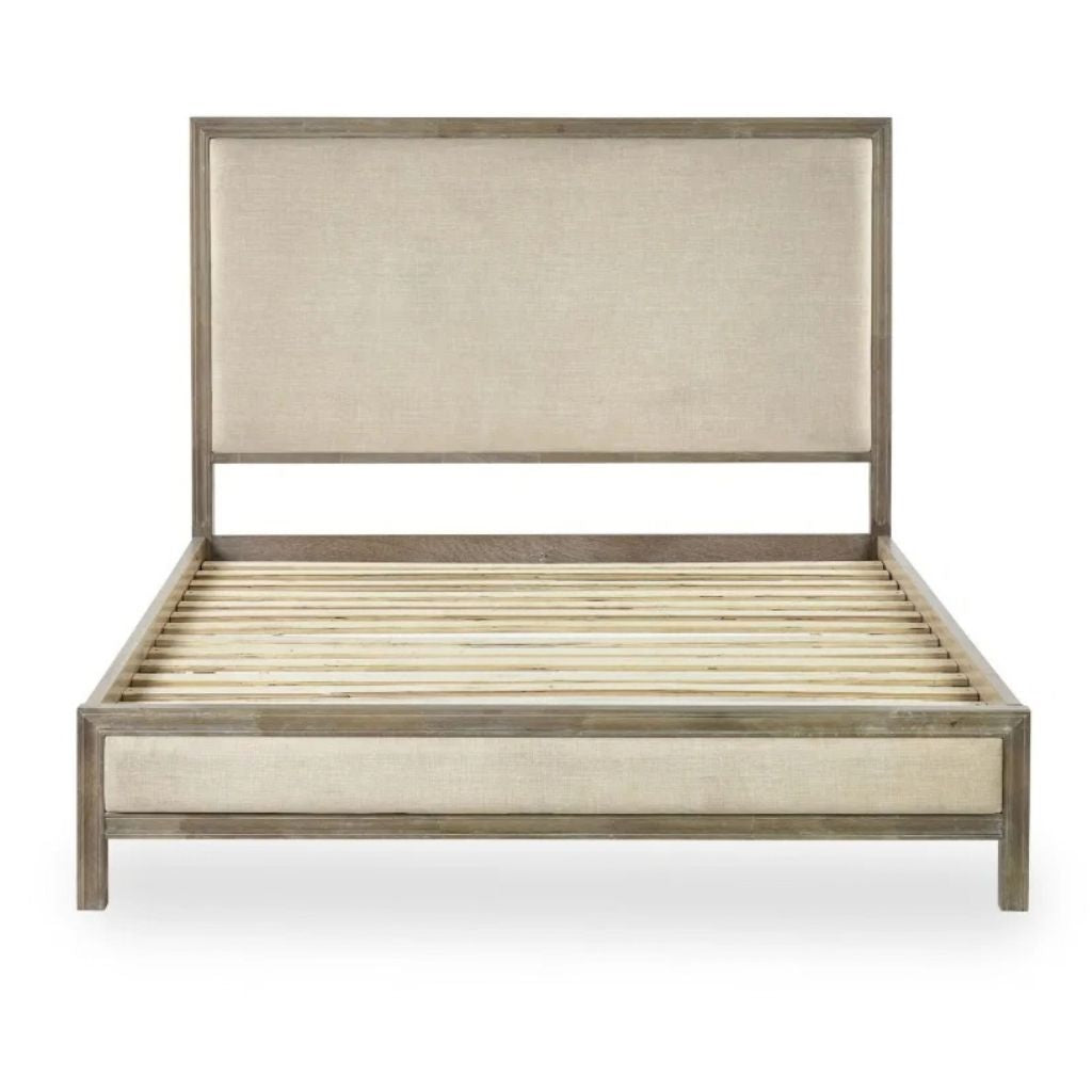 A modern platform bed frame with a tall upholstered headboard and footboard, upholstered in a light beige fabric.