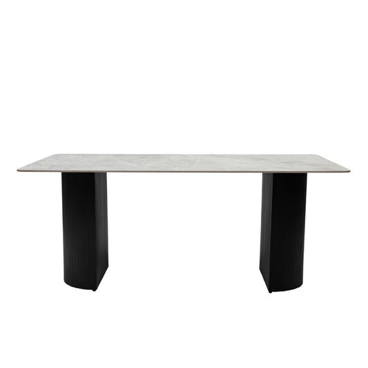 Rectangular table with a light gray top and black legs on a white background