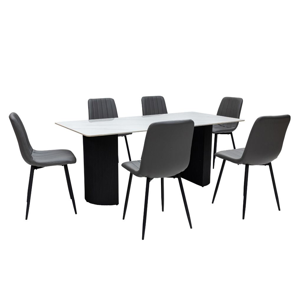 Dining table with six chairs on a white background