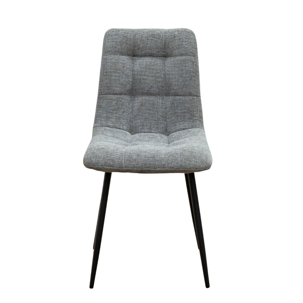 Grey upholstered chair with black legs on a white background