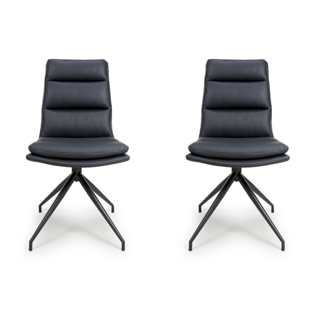 Two black leather chairs with metal legs on a white background