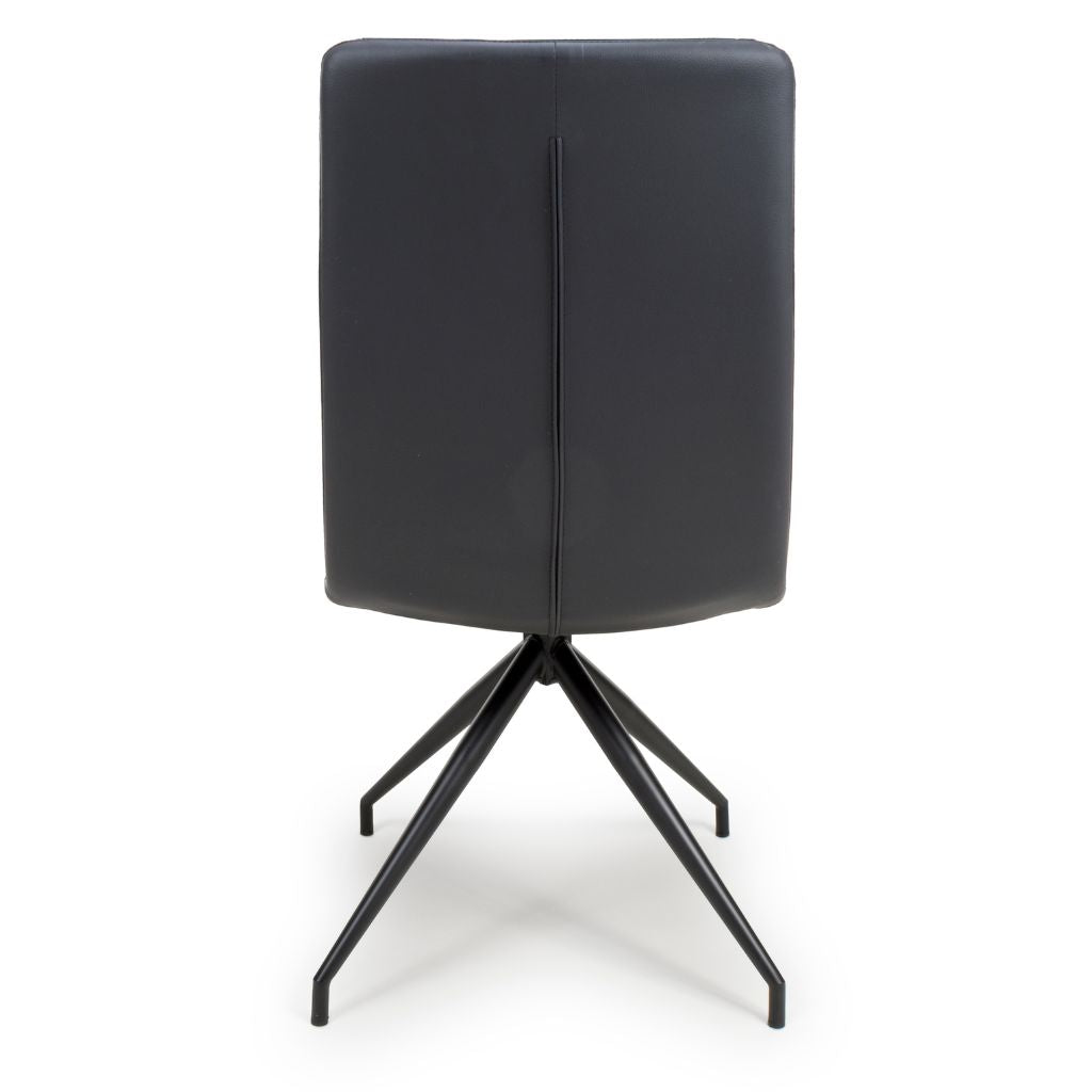 Black dining chair with a minimalist design on a white background