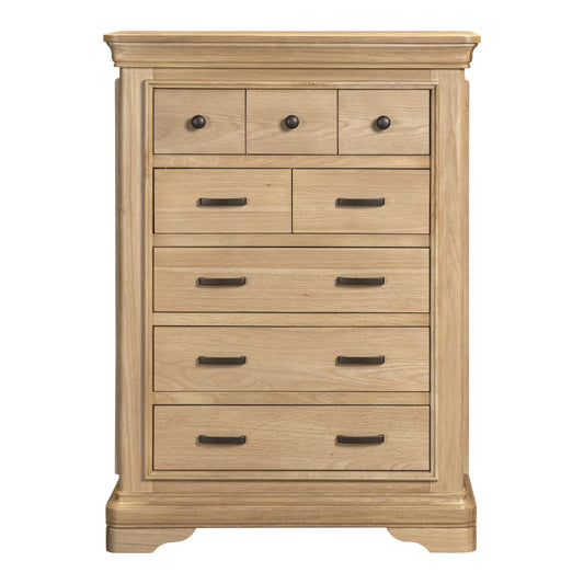Wooden dresser with multiple drawers on a white background