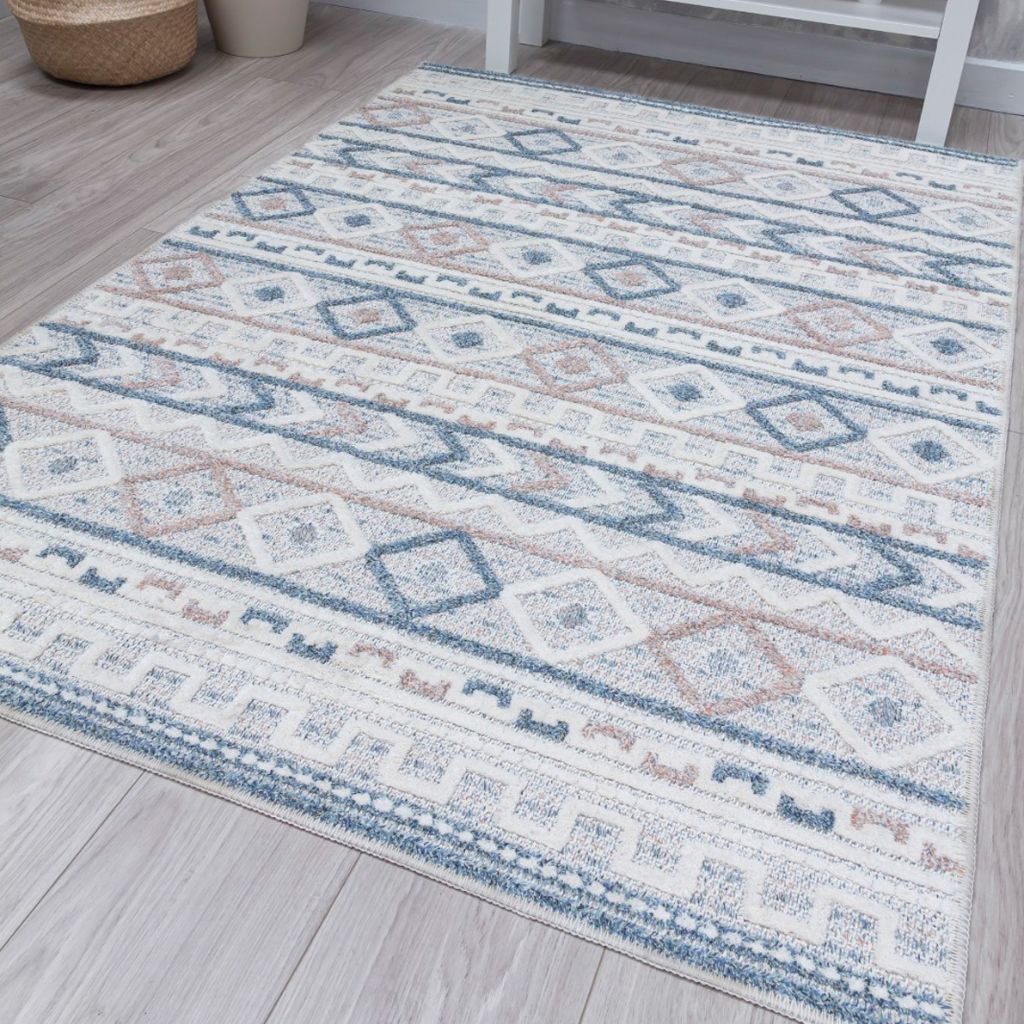 Patterned rug on a wooden floor