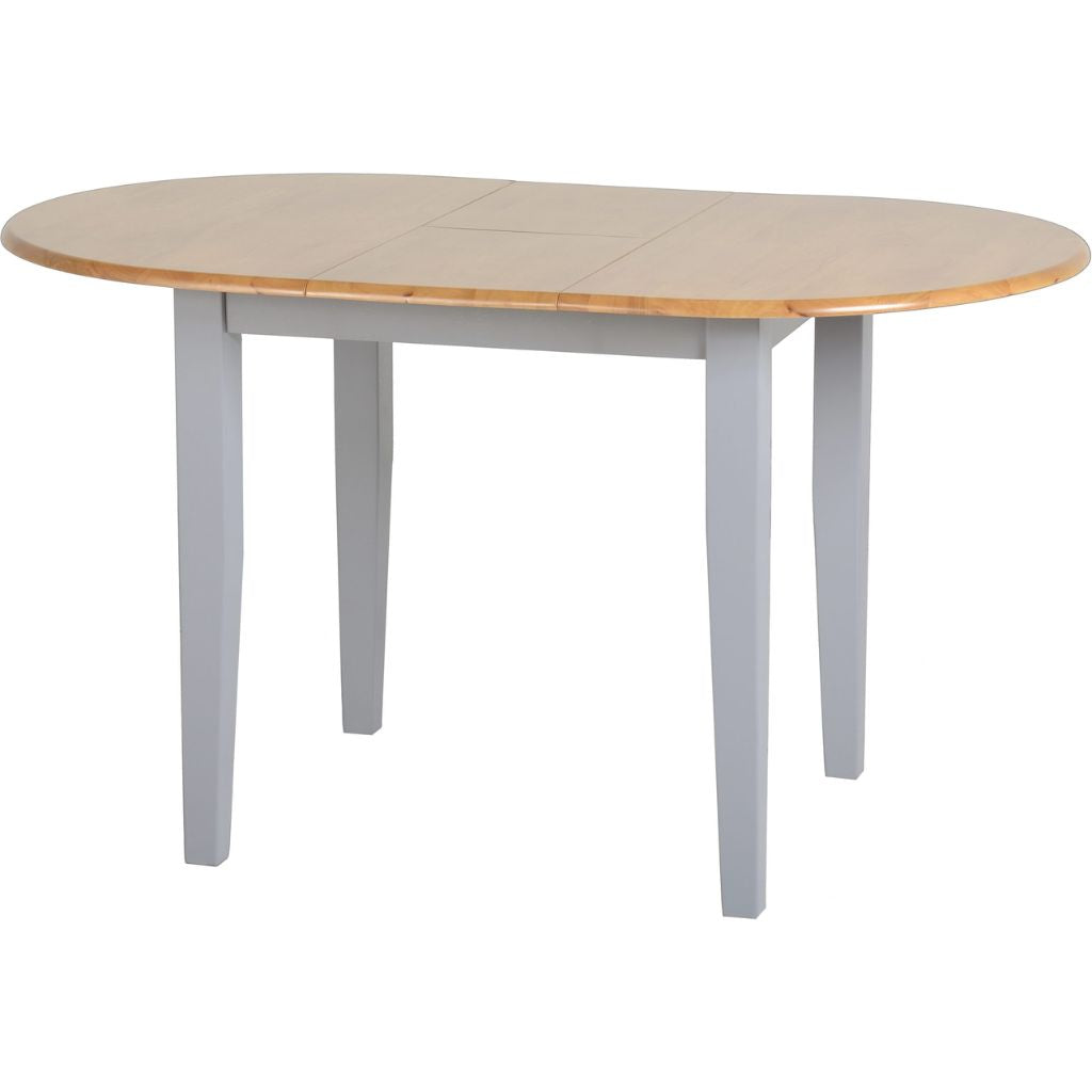An oval dining table which extending out making it perfect for guests