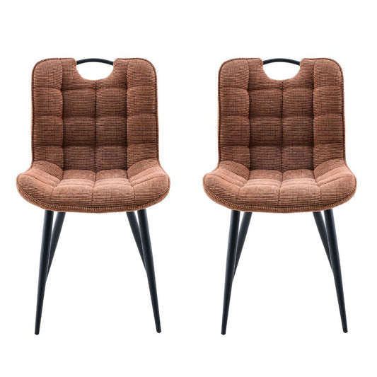 Two rust upholstered chairs with black legs on a white background