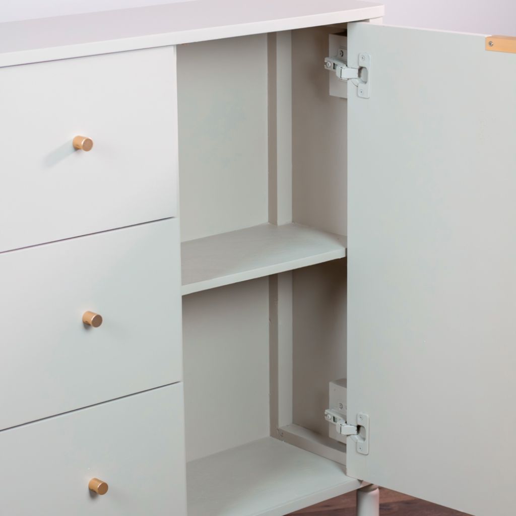 Open cabinet with light gray interior and wooden handles on a white background
