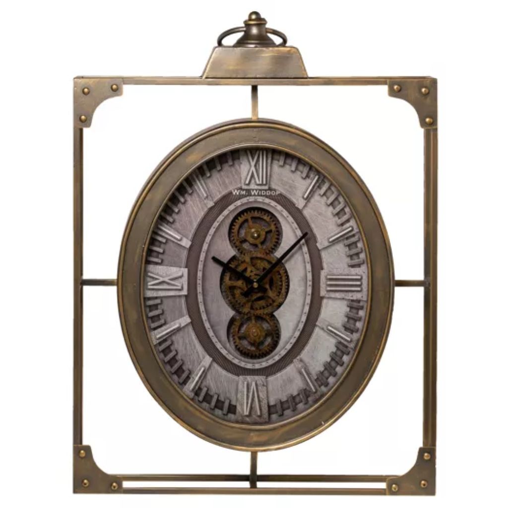 Decorative wall clock with brass frame and detailed face on a white background