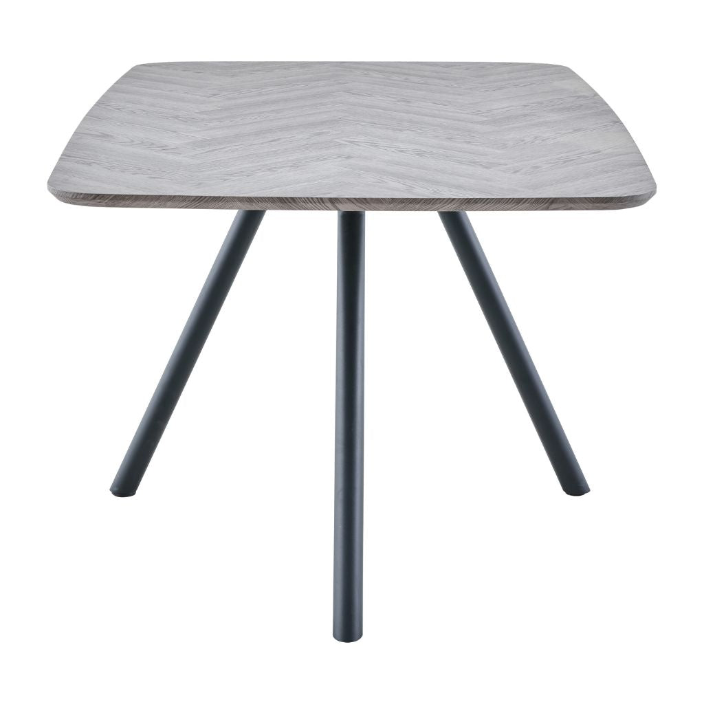 Square table with a light gray wooden top and dark legs on a white background