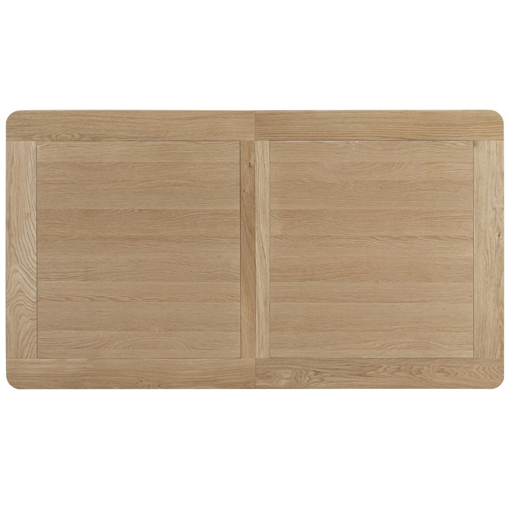 A central panel divided gives the table top visual interest while concealing the extension available