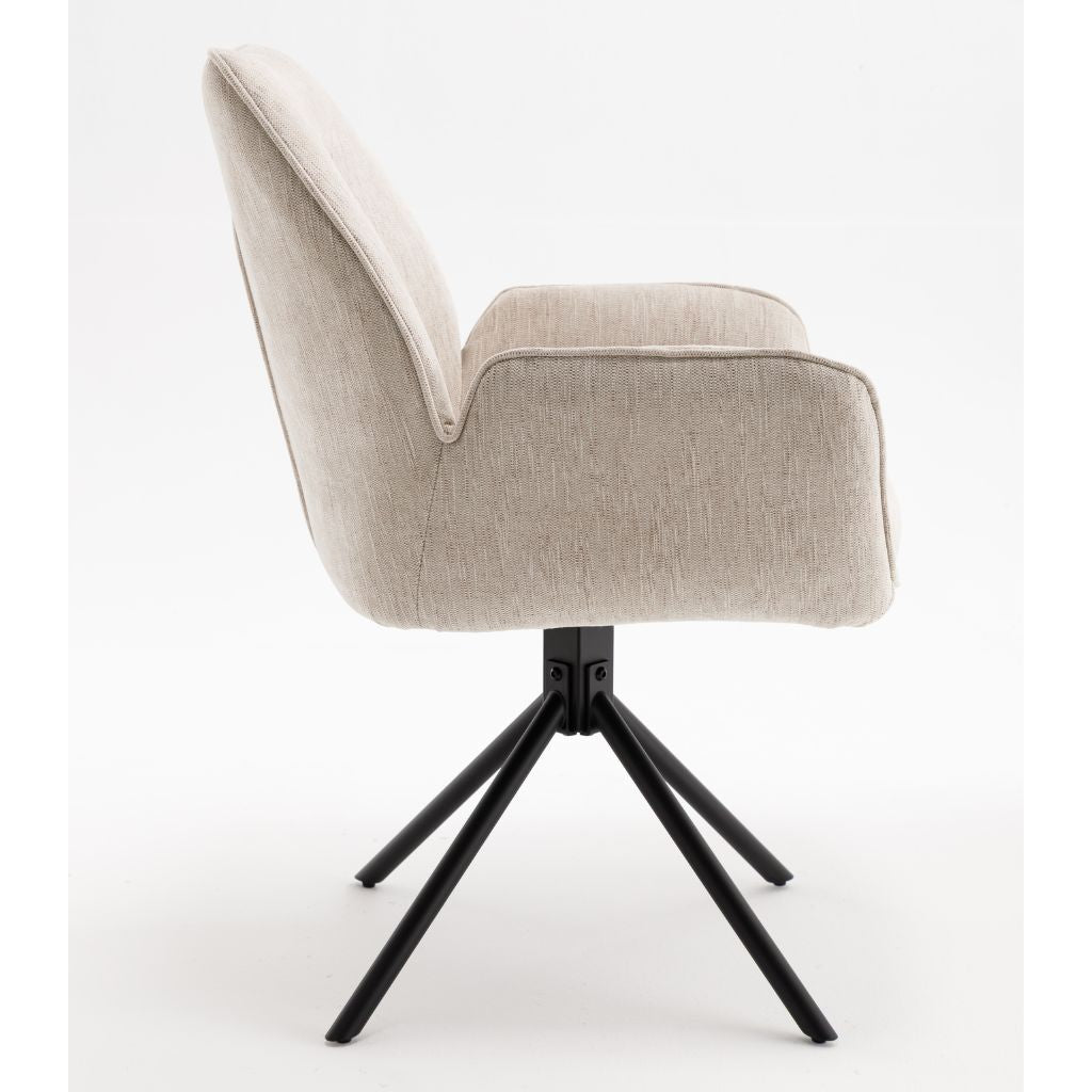 Beige armchair with black metal base on a white background