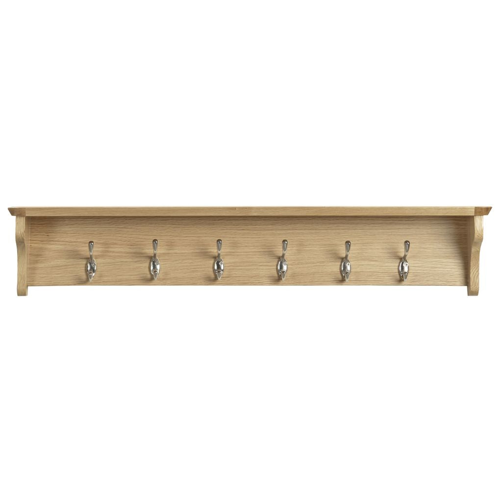 A light natural wood wall-mounted coat rack with six silver metal hooks.