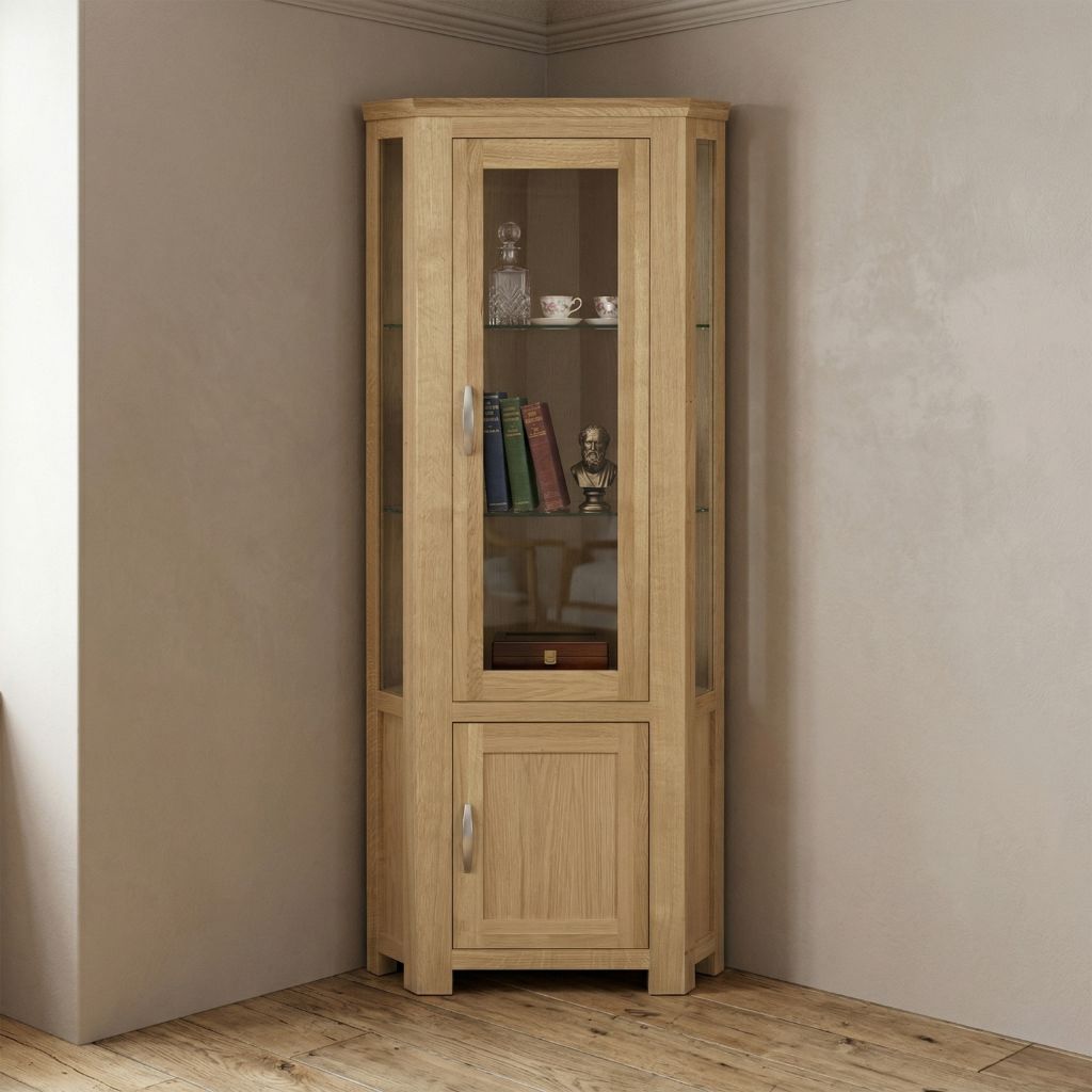 A tall corner wooden cabinet with a glass-front upper section and a lower solid wood door.