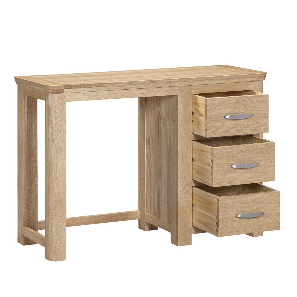 A light oak wood writing desk with three drawers on the right side, featuring silver metal handles.