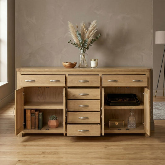 Grand oak sideboard with generous storage space with multiple drawers and cabinets 