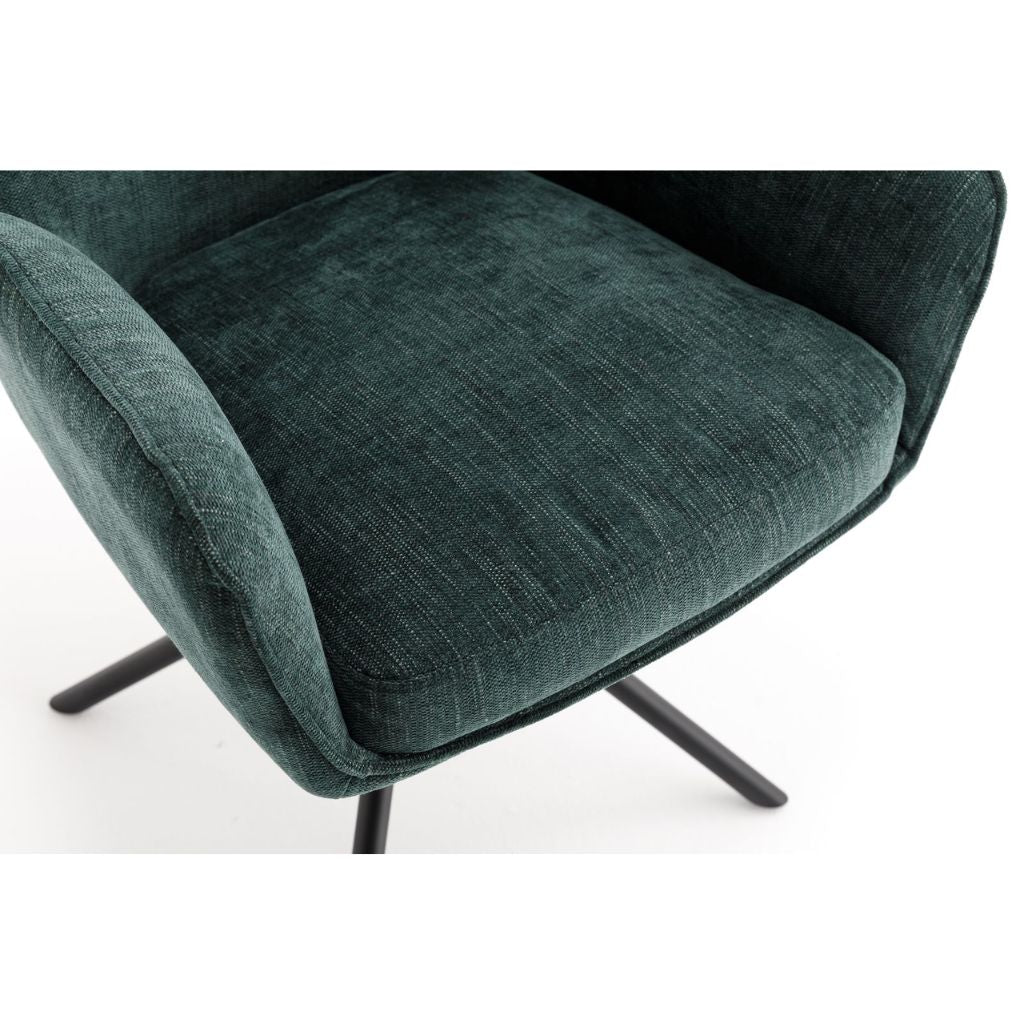 Green upholstered chair with metal legs on a white background