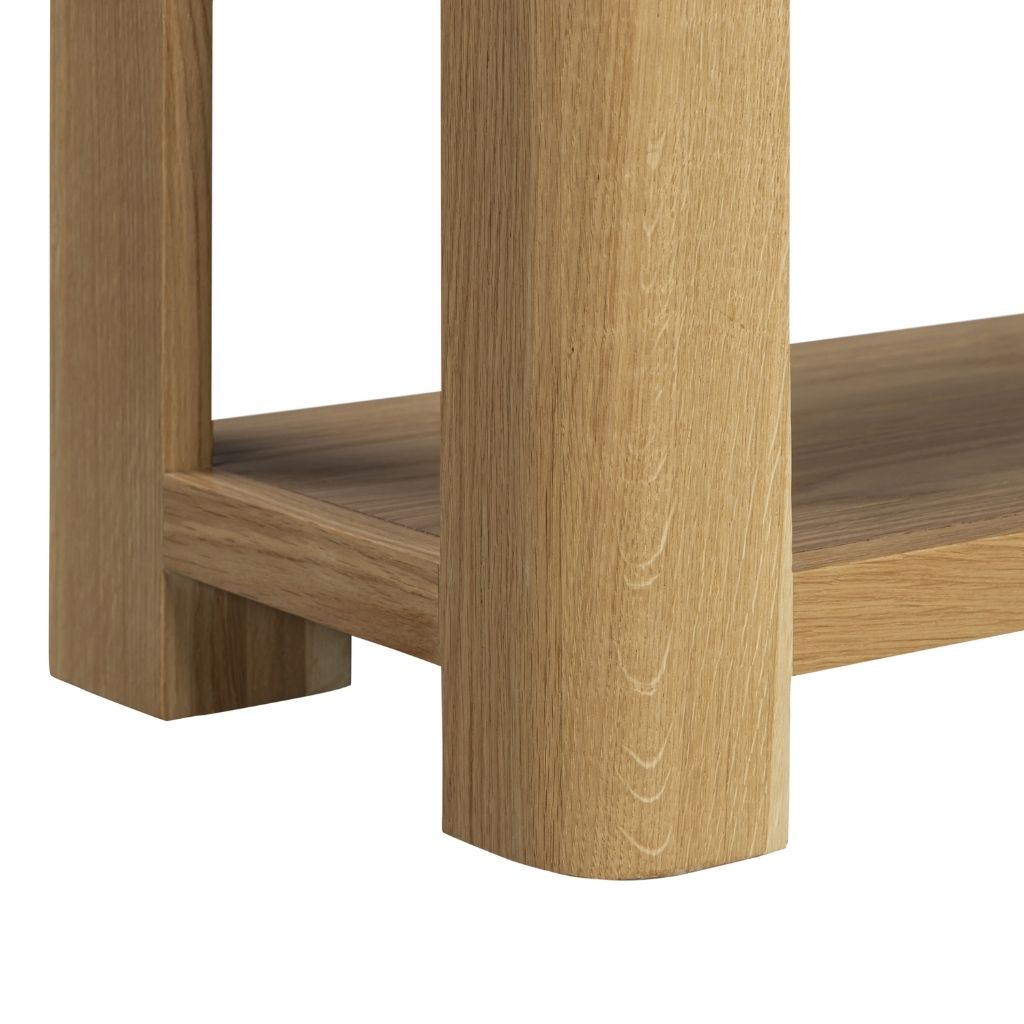 close up of the stylish and modern feel the curved legs give the large console