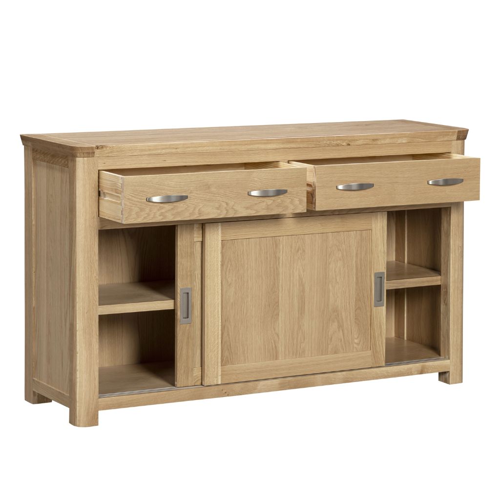 Solid oak sideboard showcasing the storage it has to offer with two sliding door cabinets and two drawers above.