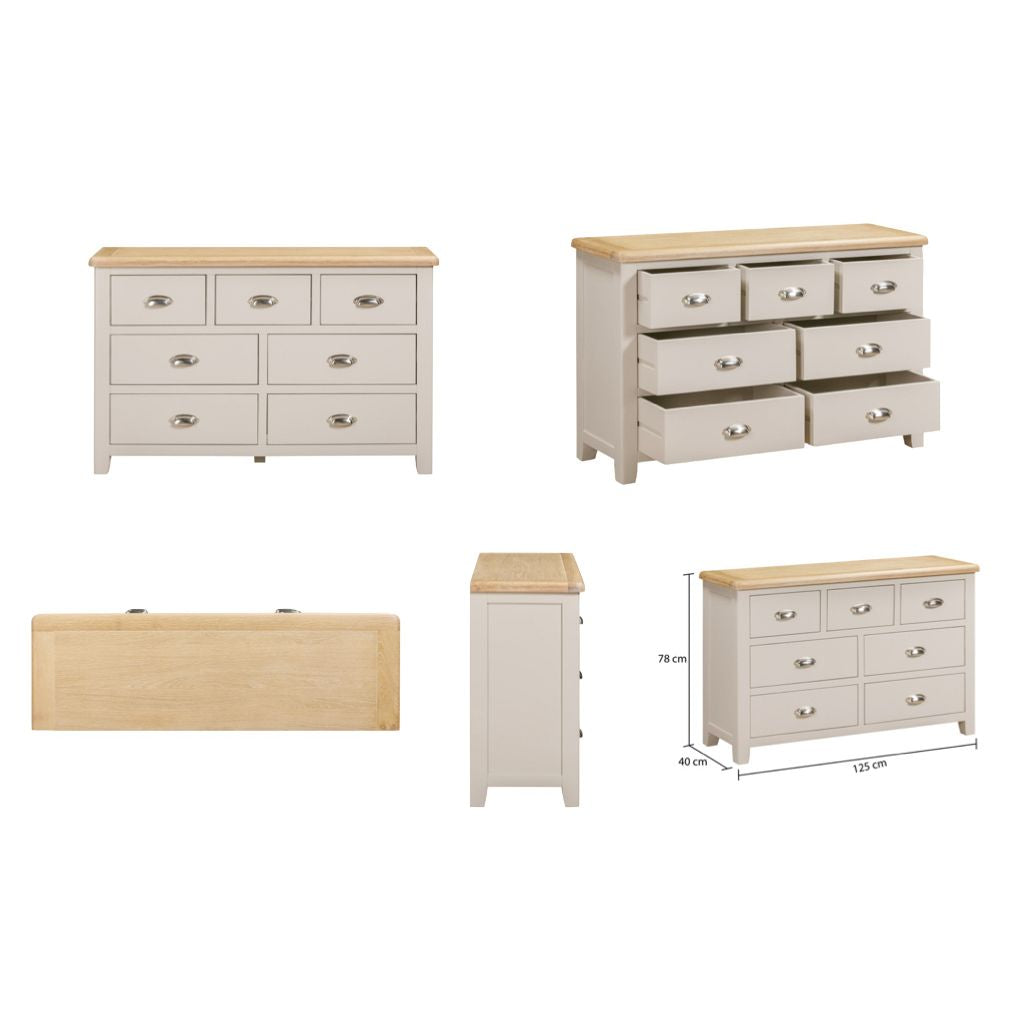 Set of wooden dressers with light grey and natural wood finishes on a white background