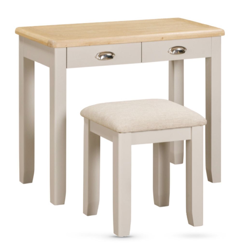 Dressing table with two drawers and a matching stool on a white background