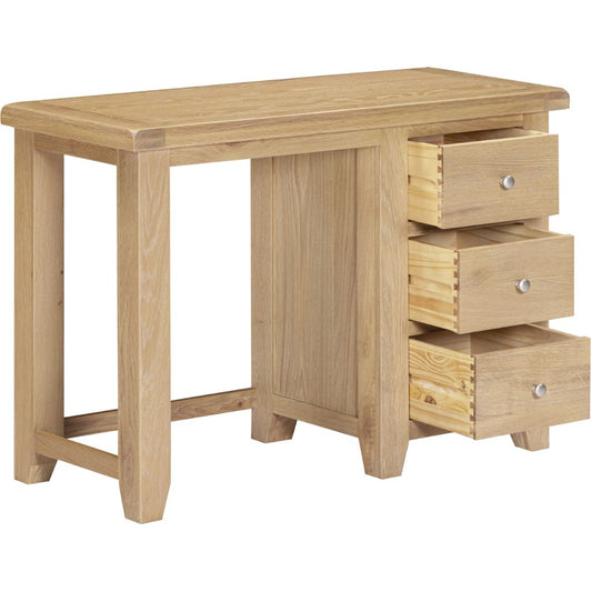 Wooden desk with three drawers on a white background