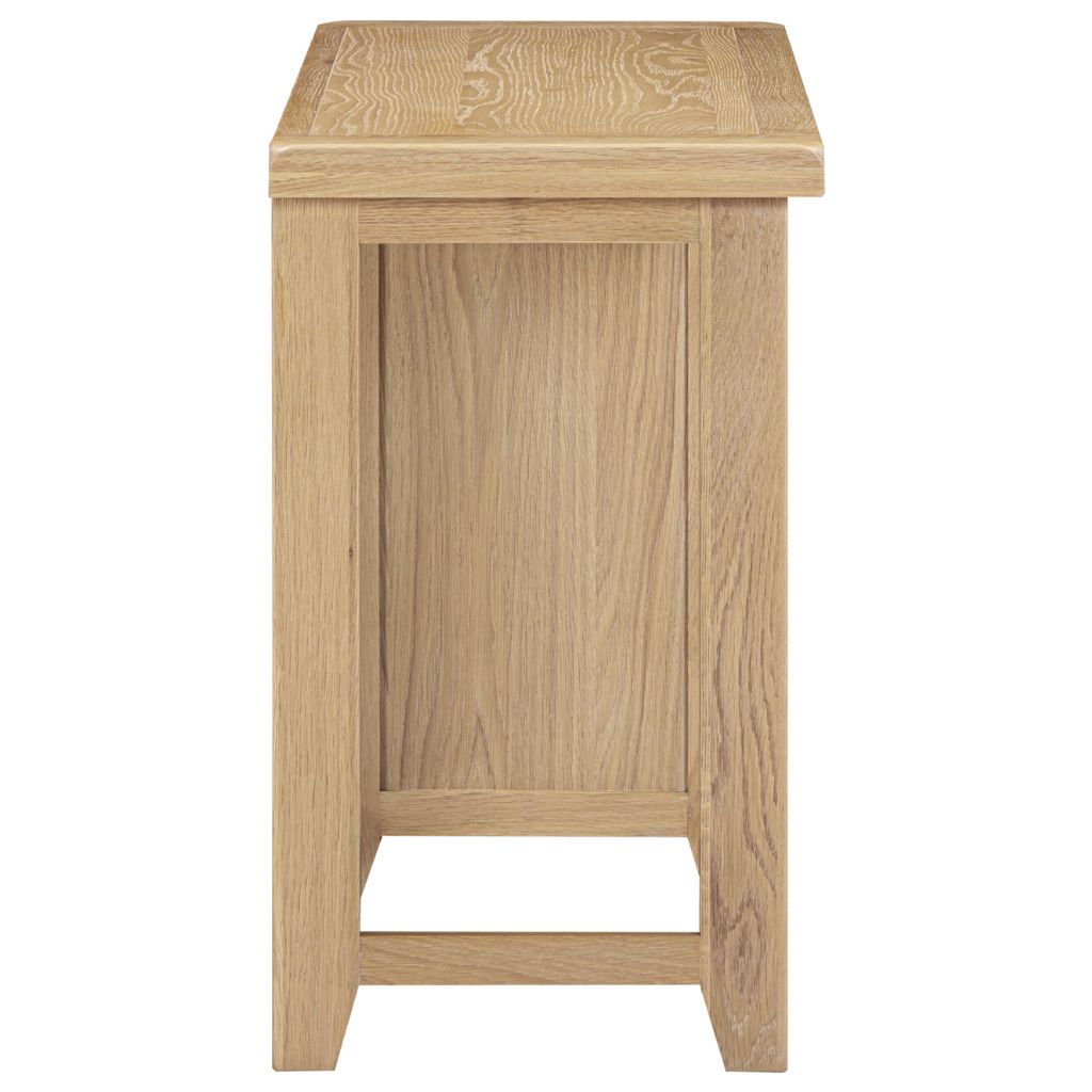 Wooden desk with a light brown finish on a white background
