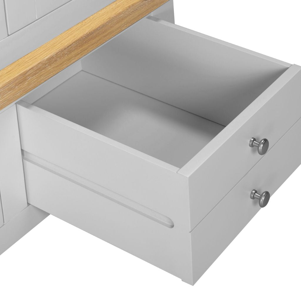 Open gray drawer with wooden top on a white background