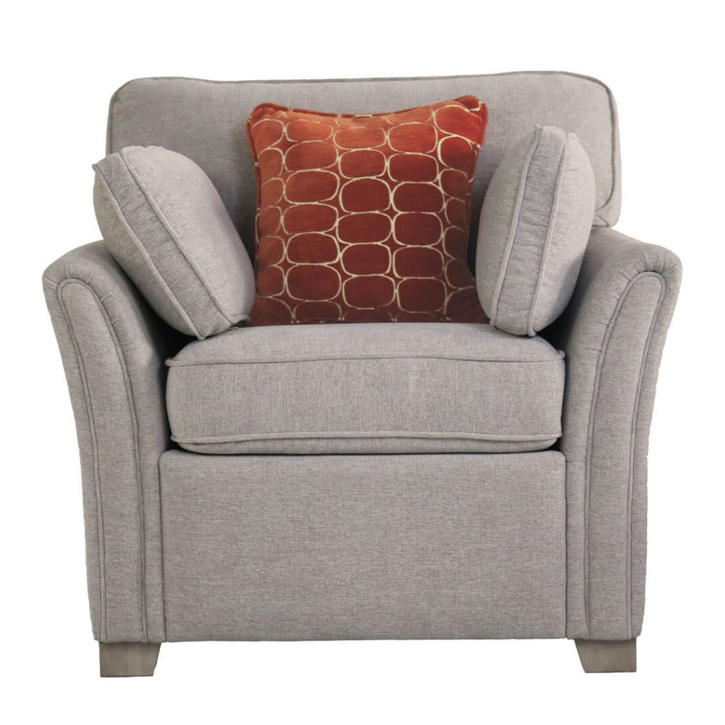 Natural armchair with a red patterned pillow on a white background