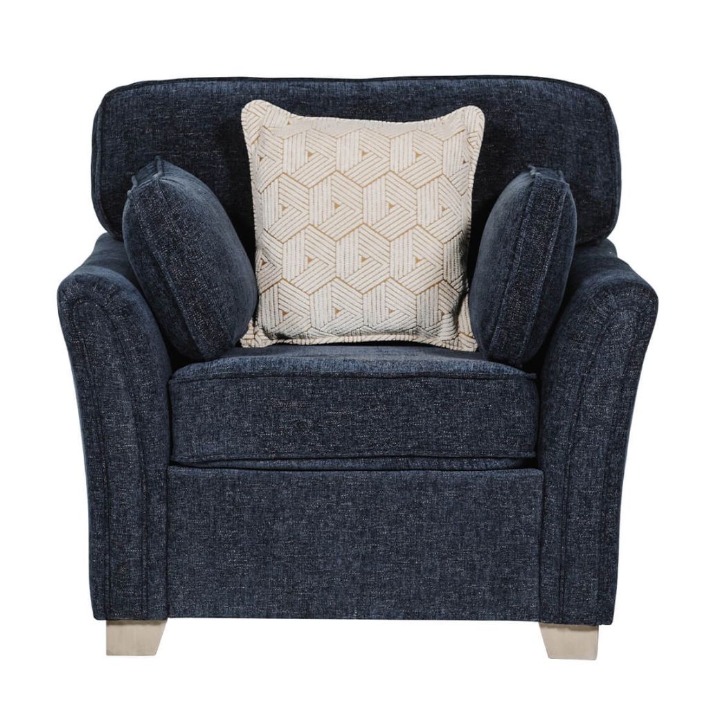 Blue armchair with a patterned pillow on a white background