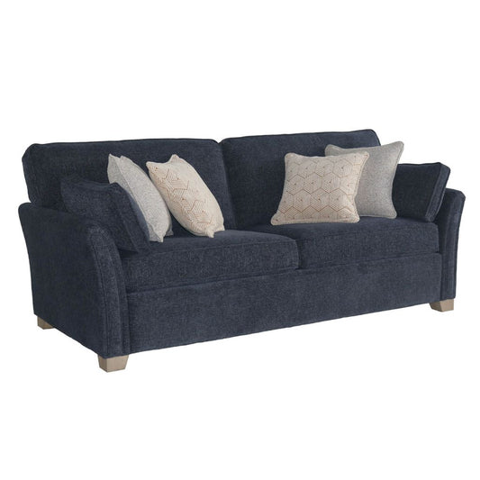 Blue sofa with decorative pillows on a white background