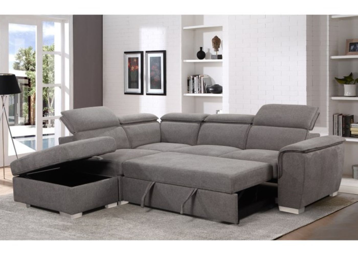 Modern grey corner sofabed with adjustable headrests and hidden storage compartments