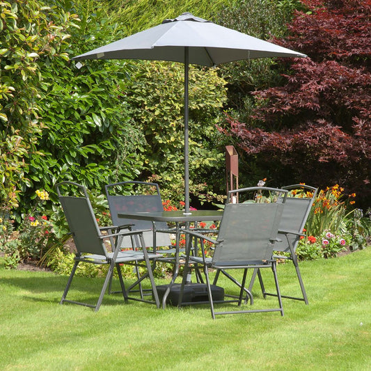 Outdoor patio set with four chairs and a parasol