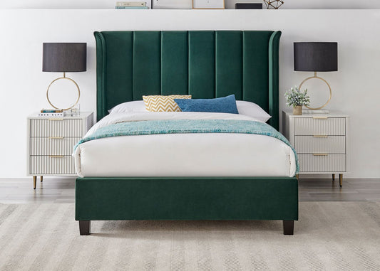 Green velvet fabric upholstered bed with tall headboard