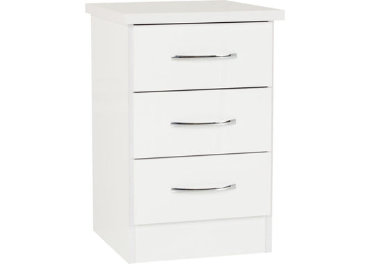 White three-drawer bedside chest with silver handles.